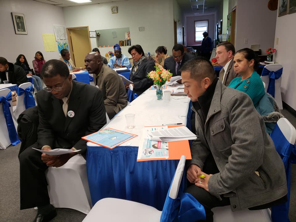 Participants listening and following the textbook